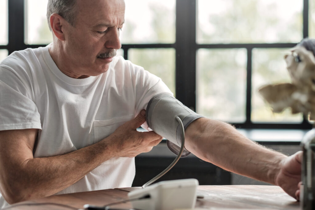 Man checking a blood pressure in the morning